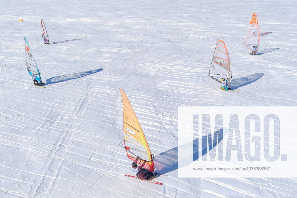 KW12 RUSSIA, NOVOSIBIRSK - MARCH 22, 2023: Participants in the Russian Winter Windsurfing Cup on the frozen Novosibirsk Reservoir. Kirill Kukhmar TASS 58005880