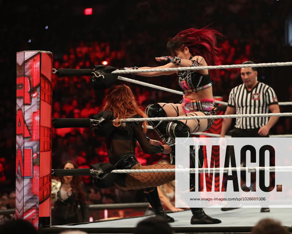 PHOENIX, ARIZONA - MARCH 27: (L-R) Becky Lynch and Iyo Sky fighting during WWE WrestleMania RAW at the Footprint Center on March 27, 2023 in Phoenix, Arizona, United States. Phoenix United States - ZUMAp175 20230327_zsa_p175_027