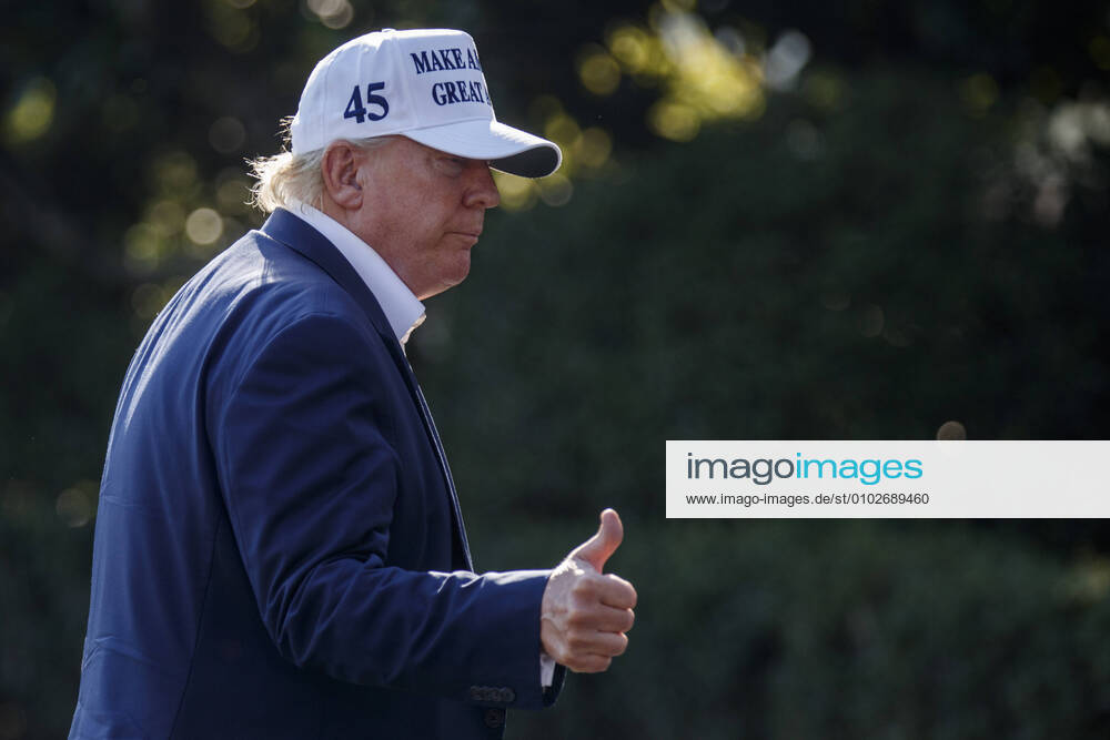 US President Donald J. Trump walks to the South Portico after stepping off Marine One on the South Lawn of the White House in Washington, DC, USA, 26 July 2020. President Trump is returning to Washington after spending the weekend at his club in Bedminster, New Jersey Washington USA - ZUMAs152 20200726_zaa_s152_007