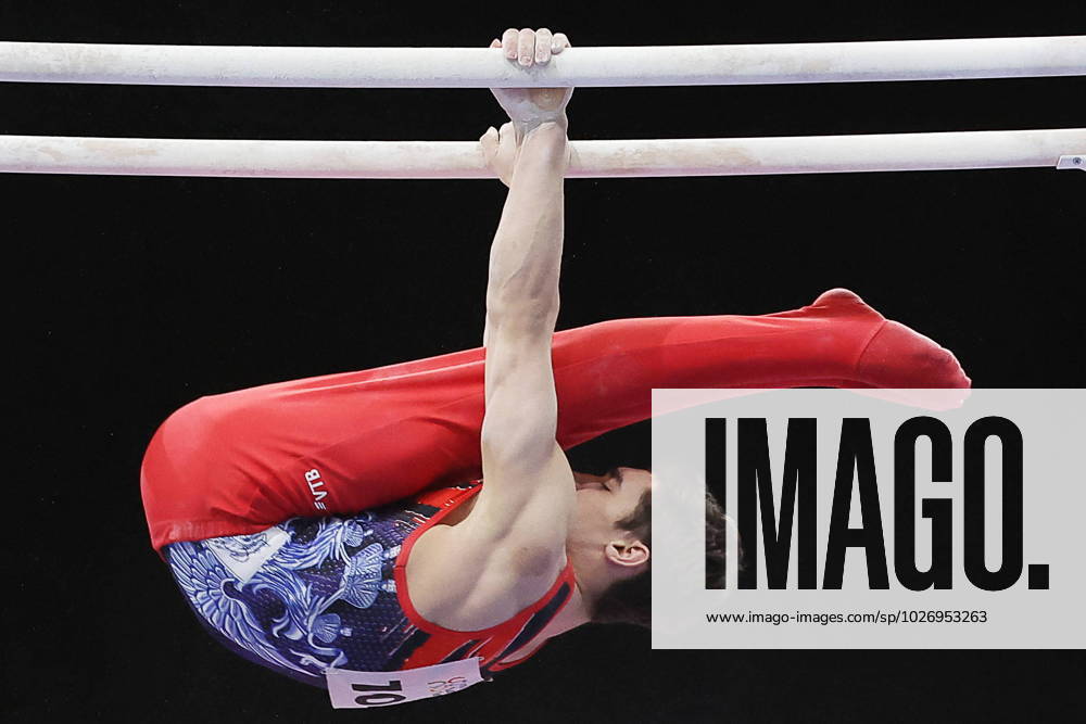 KW13 RUSSIA, YEKATERINBURG - MARCH 31, 2023: Kirill Gashkov of Russia performs parallel bars exercises during a men s artistic gymnastics qualification event at the Legends Challenge Games gymnastics tournament held at the Yekaterinburg Expo international exhibition center. Donat Sorokin TASS 58161132