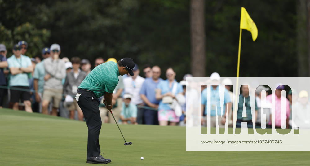 Patrick Reed putts on the first green during the first round at the Masters tournament at Augusta National Golf Club in Augusta, Georgia on Thursday, April 6, 2023. AUG20230406242 JOHNxANGELILLO