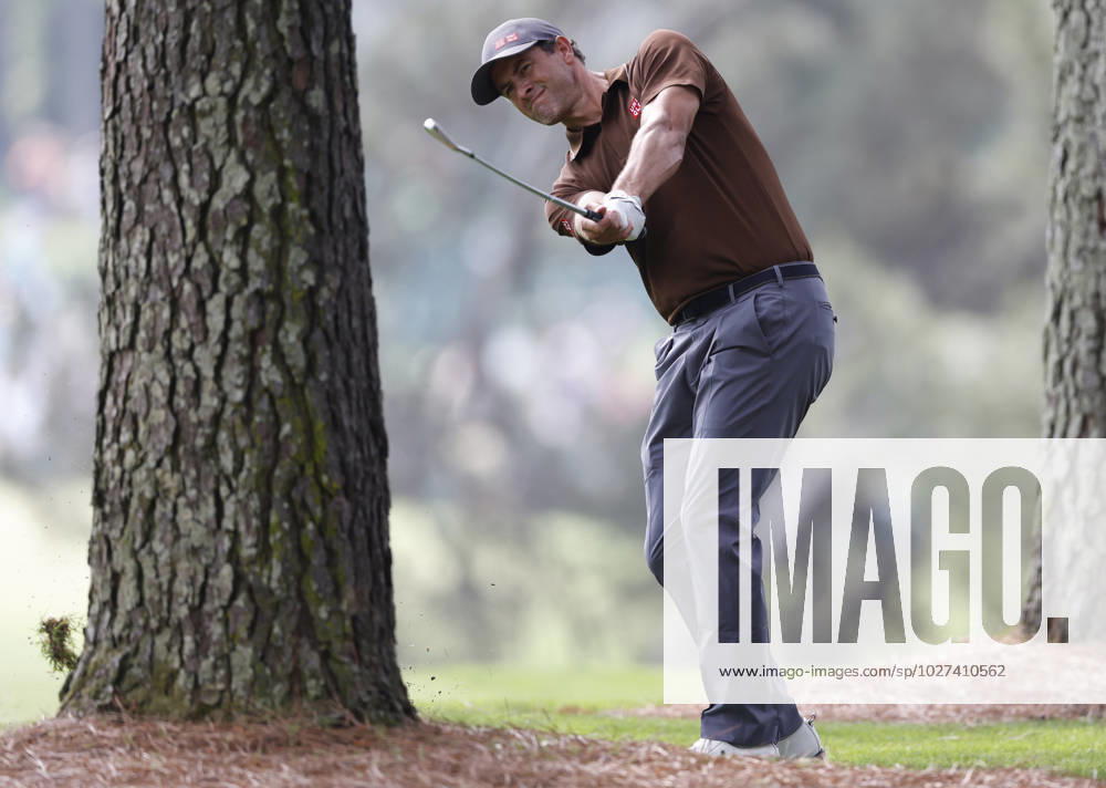 Adam Scott hits from pine straw on first hole during the first round at the Masters tournament at Augusta National Golf Club in Augusta, Georgia on Thursday, April 6, 2023. AUG20230406246 JOHNxANGELILLO