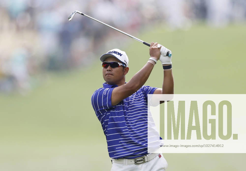 Hideki Matsuyama of Japan hit his approach shot to the first green in the first round at the Masters tournament at Augusta National Golf Club in Augusta, Georgia on Thursday, April 6, 2023. AUG20230406022 JOHNxANGELILLO