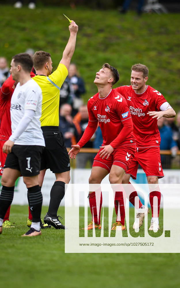 Football, 2022 2023 season, Regionalliga West, 08 04 2023, 29 matchday, men, 1 FC Bocholt white vs 1 FC Koeln U23 red v l Johannes Liedtke Referee , Leon Schneider 1 FC Koeln U23, yellow card , Lukas Nottbeck 1 FC Koeln U23 , Bocholt Sportanlage 1 FC Bocholt Gigaset Arena Nordrhein Westfalen Germany 230408_fb_1fc-bocholt_1fc-koeln-u23_16286