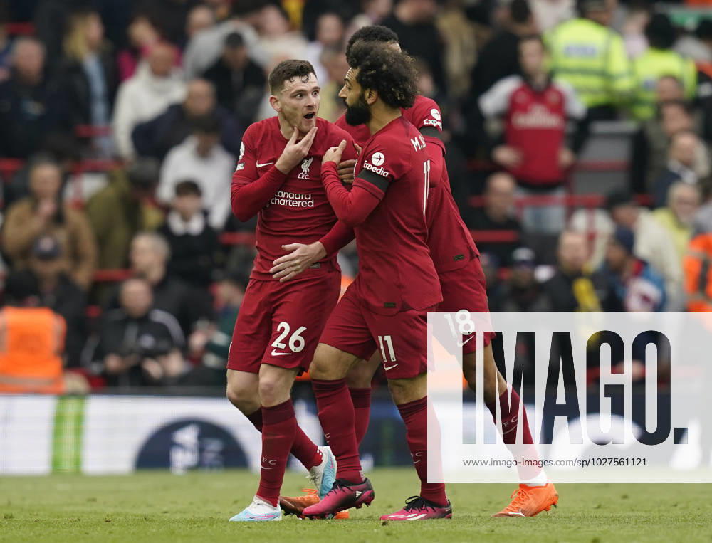 Liverpool, England, 9th April 2023. Andrew Robertson of Liverpool is held back by Mohamed Salah of Liverpool at half timeduring the Premier League match at Anfield, Liverpool. Picture credit should read: Andrew Yates Sportimage . SPI-2358-0080