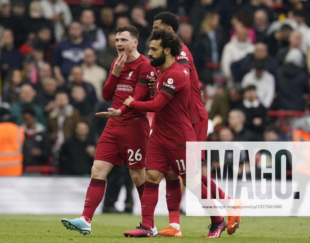 Liverpool, England, 9th April 2023. Andrew Robertson of Liverpool is led away as he claims he was elbowed in the chin by the assistant referee during the Premier League match at Anfield, Liverpool. Picture credit should read: Andrew Yates Sportimage . SPI-2358-0083