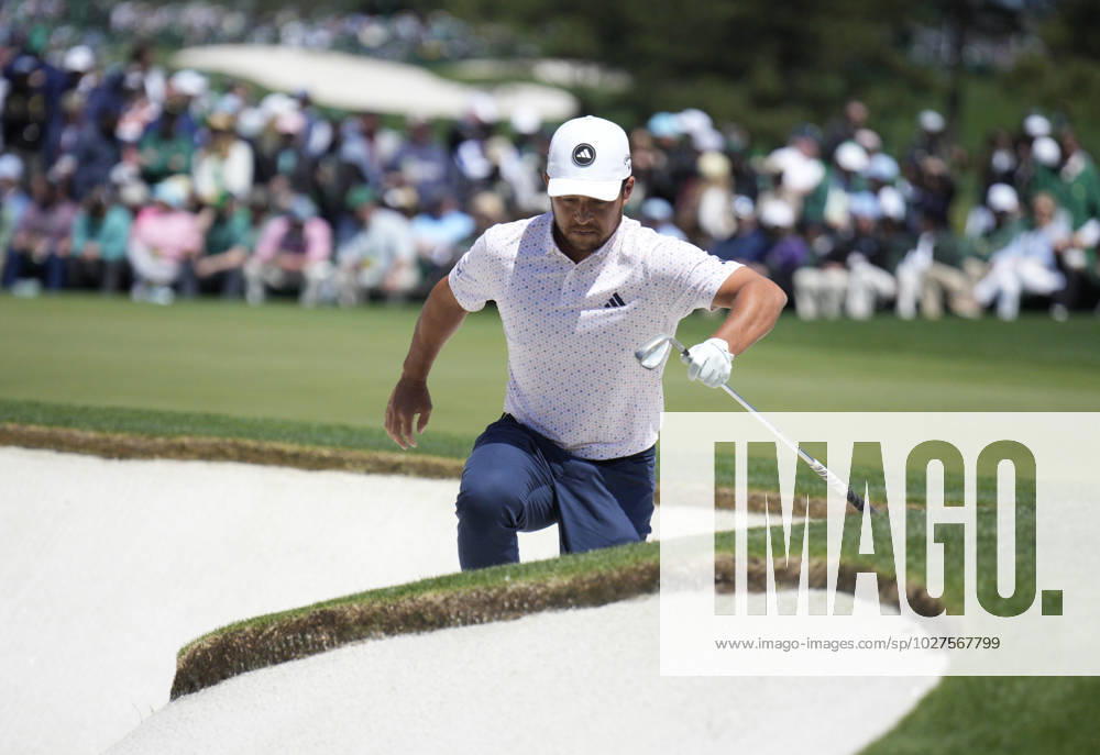 Golf, PGA, Masters Tournament in Augusta Xander Schauffele climbs out of a bunker at the 2nd green during the final round at the 87th Masters tournament at Augusta National Golf Club in Augusta, Georgia on Sunday, April 9, 2023. AUG20230409208 BOBxSTRONG