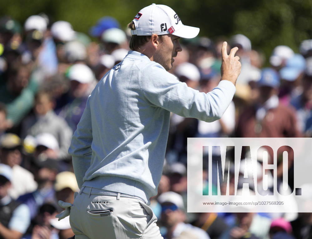 Golf, PGA, Masters Tournament in Augusta Russell Henley waves after sinking putt at the 2nd hole during the final round at the 87th Masters tournament at Augusta National Golf Club in Augusta, Georgia on Sunday, April 9, 2023. AUG20230409220 BOBxSTRONG