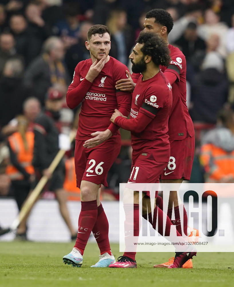 Liverpool, England, 9th April 2023. Andrew Robertson of Liverpool is held back by Mohamed Salah of Liverpool at half time after being struck by the linesman during the Premier League match at Anfield, Liverpool. Picture credit should read: Andrew Yates Sportimage . SPI-2358-0172