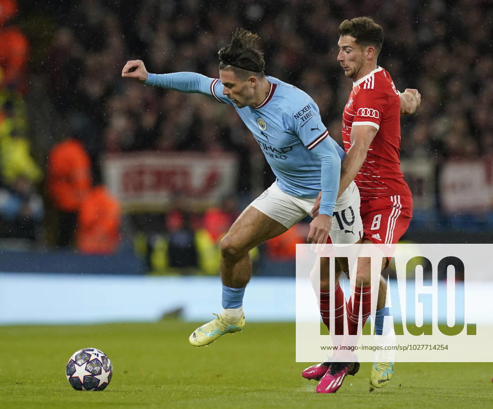 Manchester, England, 11th April 2023. Jack Grealish of Manchester City tackled by Leon Goretzka of Bayern Munich during the UEFA Champions League match at the Etihad Stadium, Manchester. Picture credit should read: Andrew Yates Sportimage . SPI-2360-0030