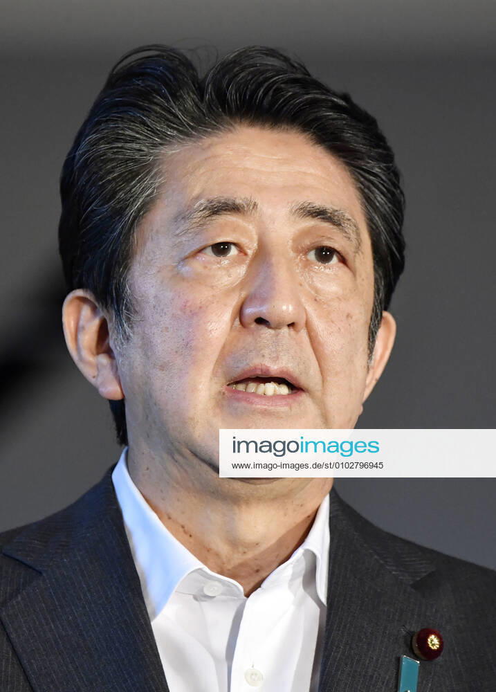 Japan PM Abe Japanese Prime Minister Shinzo Abe speaks to reporters at his office in Tokyo on July 31, 2020.