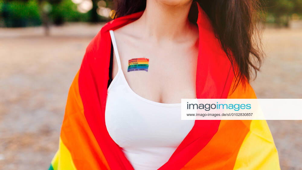 Woman with an lgtb flag and a gay pride tattoo on her chest Pinto, Community of Madrid, Spain CR_DIRR200722F-447958-01 ,model released, Symbolfoto