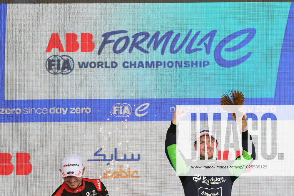 Winner Nick Cassidy NZL Envision cheering with Pkal on the podium, Race 2, Formula E FIA World Championship, Berlin E Prix, 23 04 2023, Tempelhof, Germany