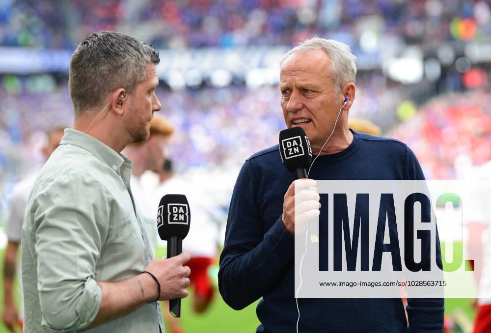Christian Streich SC Freiburg, head coach in conversation with Sebastian Kneissl DAZN expert , GER, SC Freiburg vs FC Schalke 04, Football, Bundesliga, Men, 29 Matchday, Season 2022 2023, 23 04 2023, DFL REGULATES PROHIBIT ANY USE OF PHOTOGRAPHS AS IMAGE SEQUENCES AND OR QUASI VIDEO , GER, SC Freiburg vs FC Schalke 04, Football, Bundesliga, Men, 29 Spieltag, Spielzeit 2022 2023, 23 04 2023, Freiburg im Breisgau