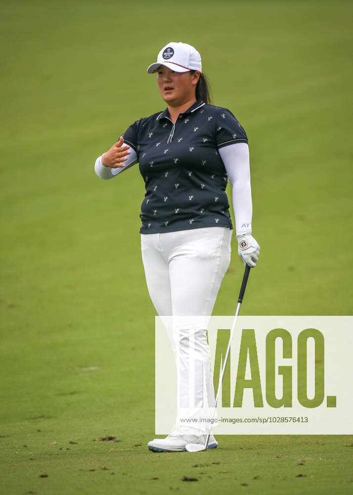THE WOODLANDS, TX - APRIL 23: Angel Yin (USA) gestures to her caddie on approach 9 during the final round of the LPGA, Golf Damen Chevron Championship on April 23, 2023 at The Club at Carlton Woods in The Woodlands, Texas. (Photo by Leslie Plaza Johnson Icon Sportswire) GOLF: APR 23 LPGA The Chevron Championship Icon230423092