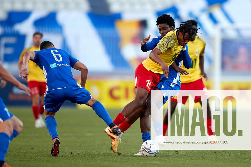 TA QALI, MALTA - 26 APRIL: Paul Mbong (C) of Birkirkara FC, vies for the ball with Roderick Briffa (L) and Precious Linus Tenebe (R) both of Mosta FC during the IZIBET FA Trophy (National Cup) soccer semi-final match between Birkirkara FC and Mosta FC at the National Stadium, Ta Qali, Malta on 26 April, 2023. Birkirkara FC v Mosta FC MLT_FAT_22_23