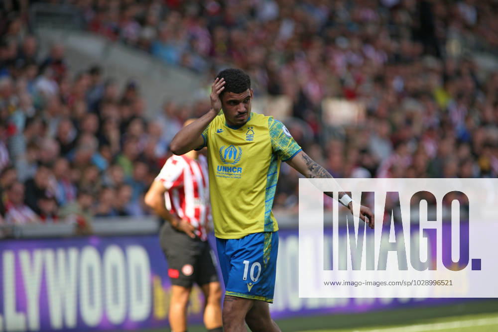 Morgan Gibbs-White of Nottingham Forest soar head after being hit with the ball during the Premier League match between Brentford and Nottingham Forest at Gtech Community Stadium, London, England on 29 April 2023.