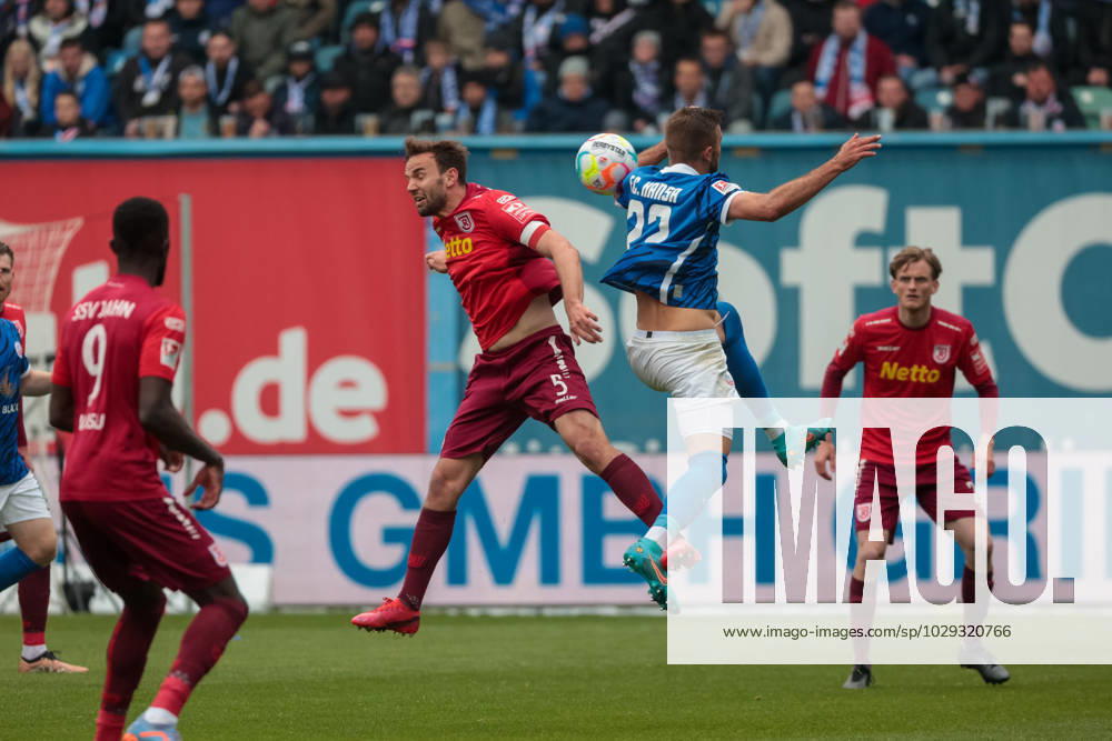 Left Benedikt Gimber Regensburg vs Lukas Hinterseer Rostock GER, FC Hansa Rostock vs SSV Jahn Regensburg, Football, 2 Bundesliga, 31 Matchday, Season 2022 2023, 06 05 2023, DFL REGULATES PROHIBIT ANY USE OF PHOTOGRAPHS AS IMAGE SEQUENCES AND OR QUASI VIDEO, GER, FC Hansa Rostock vs SSV Jahn Regensburg, Football, 2 Bundesliga, 31 Matchday, Season 2022 2023, 06 05 2023 Rostock