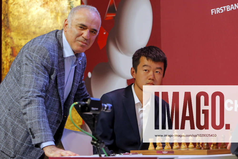 (230507) -- BUCHAREST, May 7, 2023 -- Former World Chess Champion, Garry Kasparov (L) of Russia, poses with World Chess Champion, China s Ding Liren, during the round 1 match between Ding Liren of China and Maxime Vachier-Lagrave of France at Grand Chess Tour 2023 in downtown Bucharest, capital of Romania, May 6, 2023. (Photos by Xinhua) (SP)ROMANIA-BUCHAREST-CHESS-GRAND TOUR CristianxCristel