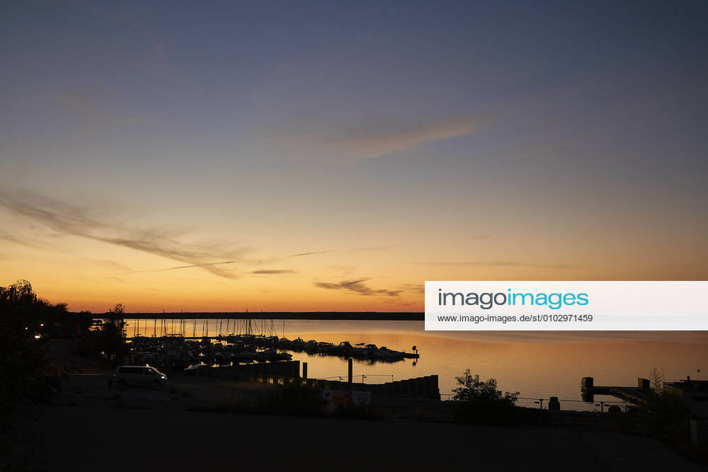 Sunset over Marina and Sportboothafen Am Geierswalder See in Geierswalde, Germany on 05 08 2020