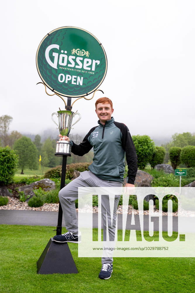 GOLF - Goesser Open 2023 MARIA LANKOWITZ,AUSTRIA,13.MAY.23 - GOLF - Alps Tour, Goesser Open, GC Erzherzog Johann, award ceremony. Image shows Ronan Mullarney (IRL). Keywords: trophy. GEPAxpictures Klansek