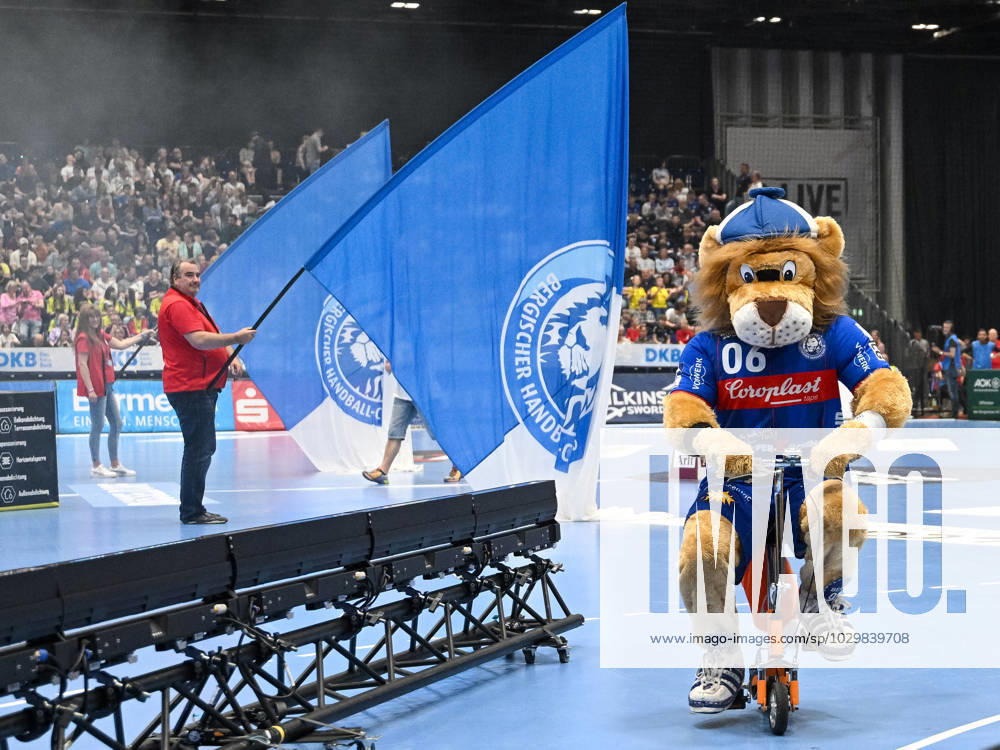 Bergi the mascot of the BHC is on the road on a two-wheeler Behind it the flag wavers of the BHC Bergischer HC vs Fuechse Berlin, handball, LIQUI Moly HBL, 29 match day, season 2022 2023, 14 05 2023 Bergischer HC vs Fuechse Berlin, handball, LIQUI Moly HBL, 29 match day, season 2022 2023, 14 05 2023 Duesseldorf