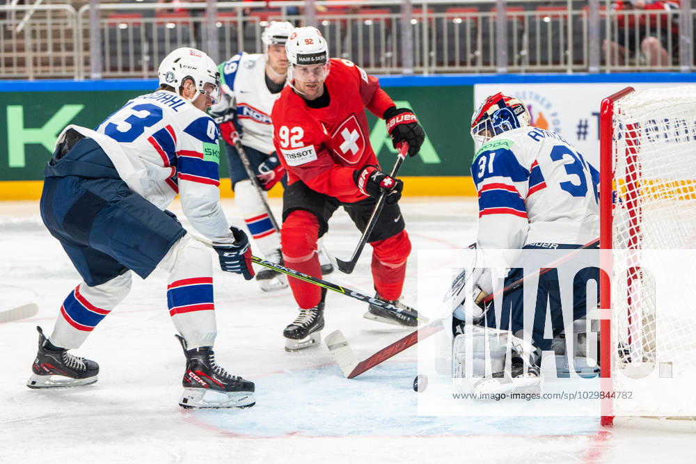 RIGA, LATVIA MAY 14 goalkeeper Jonas Arntzen of Norway in action against Gaetan Haas of Switzerland C during the 2023 IIHF Ice Hockey World Championship Finland Latvia game between Norway and Switzerland at Arena Riga on May 14, 2023 in Riga, Latvia Riga Arena Riga Latvia