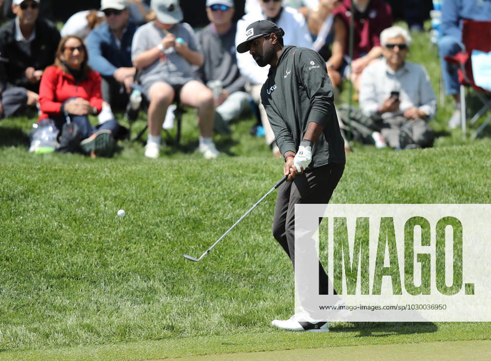 Sahth Theegala chips onto the 12th green during the first round of the 2023 PGA, Golf Herren Championship at Oakwood Country Club in Rochester,New York on Thursday, May 18, 2023. PGA20230518113 AARONxJOSEFCZYK