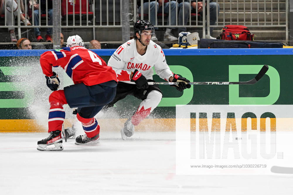 RIGA, LATVIA MAY 22 Jack Mcbain of Canada against Johannes Johannesen of Norway during the 2023 IIHF Ice Hockey World Championship Finland Latvia game between Canada and Norway at Arena Riga on May 22, 2023 in Riga, Latvia Riga Arena Riga Latvia