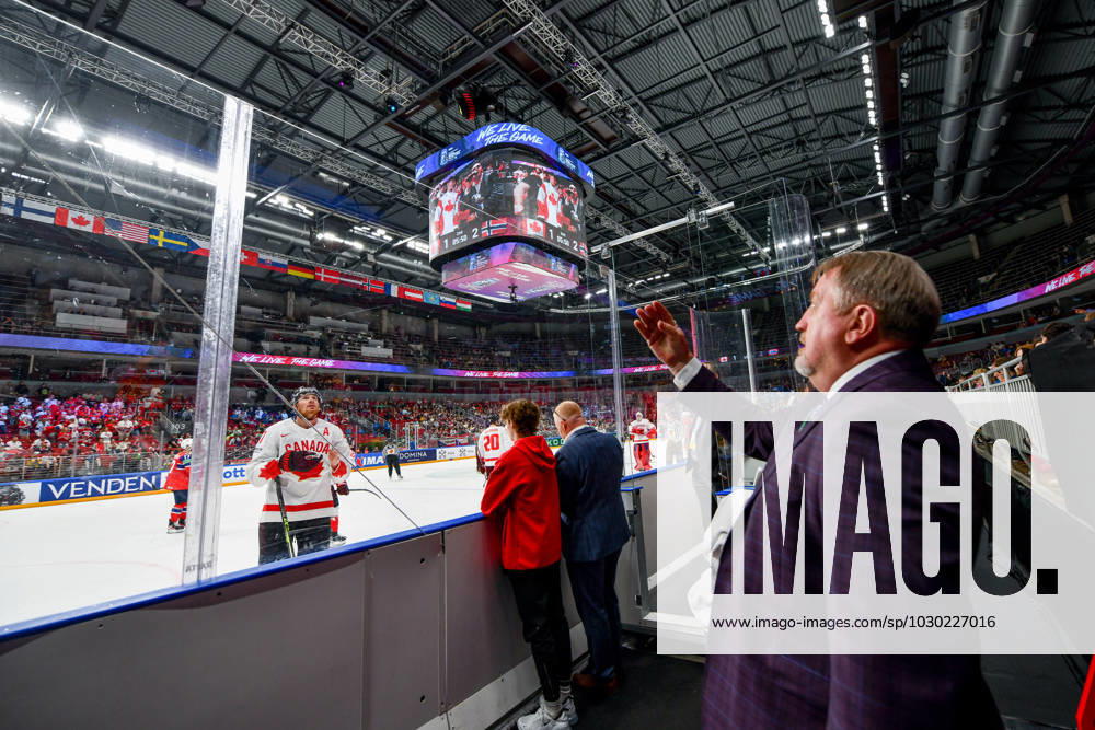 RIGA, LATVIA MAY 22 Lawson Crouse of Canada changes his gloves on the fly during the 2023 IIHF Ice Hockey World Championship Finland Latvia game between Canada and Norway at Arena Riga on May 22, 2023 in Riga, Latvia Riga Arena Riga Latvia