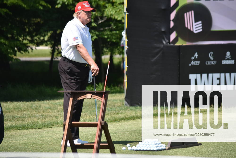 Former President of the United States Donald J. Trump swings his put as he plays golf at his golf course. Former President of the United States Donald J. Trump plays golf prior to the LIV Golf Round 1 Shotgun Start at Trump National Golf Club Washington DC in Sterling. Prior to round one of the LIV Golf Washington DC 2023 event, Former President of the United States Donald J. Trump played golf on his golf course in Sterling, Virginia Friday morning into the afternoon. Sterling United States - ZUMAs197 20230526_zaa_s197_094