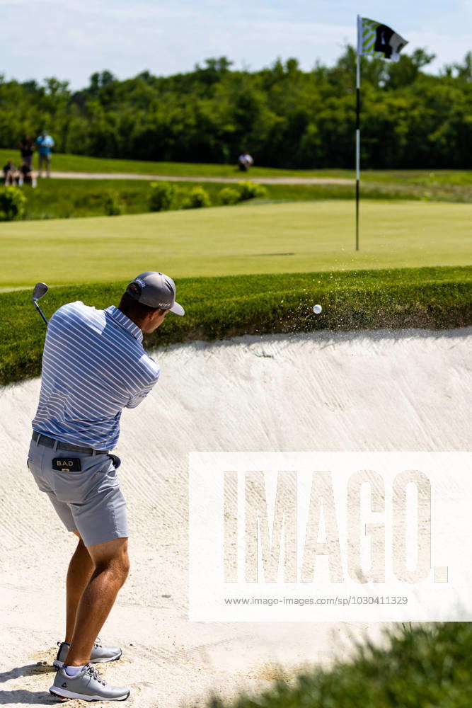 BRYSON DECHAMBEAU hits out of a sand bunker on the fourth hole of the second round of the LIV Golf DC event at Trump National Golf Club. Potomac Falls USA - ZUMAb237 20230527_znp_b237_015