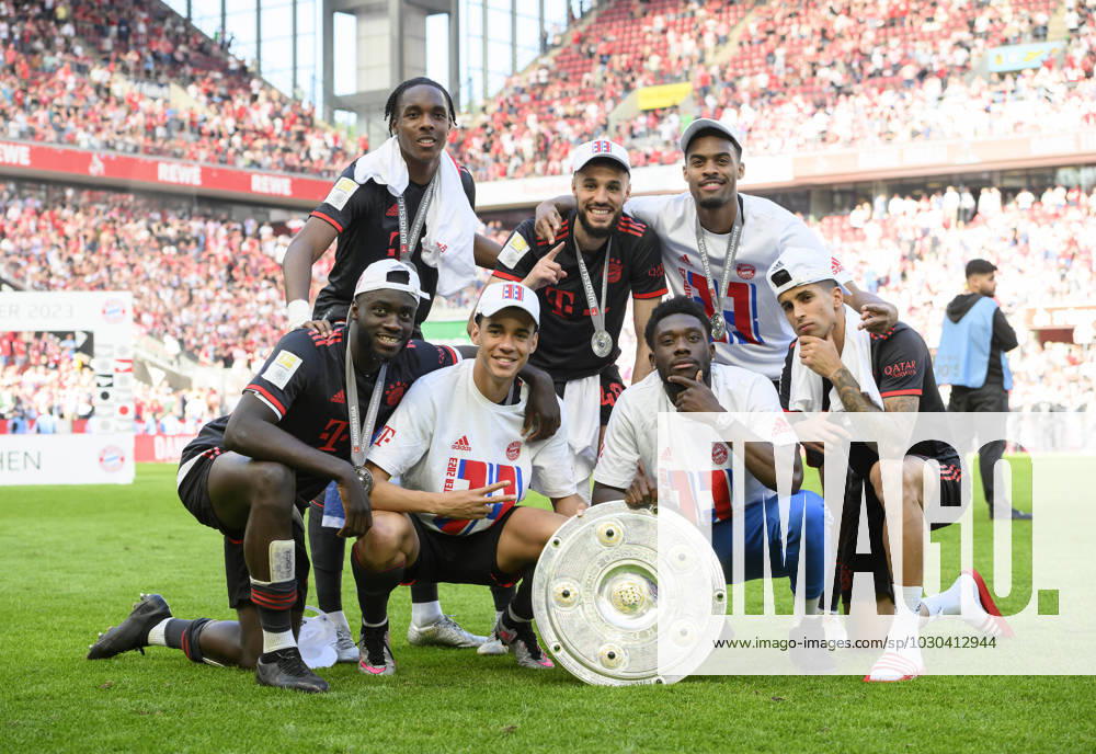 Back f l Mathys TEL M , Noussair MAZRAOUI M , Ryan GRAVENBERCH M , front f l Dayot UPAMECANO M , Jamal MUSIALA M , Alphonso DAVIES M , Joao CANCELO M pose with the championship trophy, Soccer 1 Bundesliga, 34 Spieltag, 1 FC Koeln K FC Bayern Muenchen M 1 2, on 27 05 2023 in Koeln Germany DFL regulations prohibit any use of photographs as image sequences and or quasi video Â