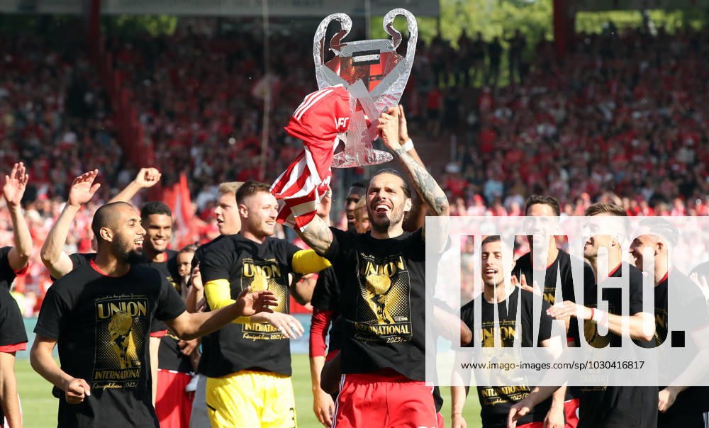Aissa Laidouni, goalkeeper Lennart Grill, Christopher Trimmel with CL trophy dummy, Josip Juranovicl, Rani Khedira, Robin Knoche, Union Berlin team celebrates participation in Champions League joy emotion jubilation sports soccer Bundesliga men DFL 34 matchday season 2022 2023 27 05 2023 1 FC Union Berlin FCU vs SV Werder Bremen SVW DFL regulations prohibit any use of photographs as image sequences and or quasi video