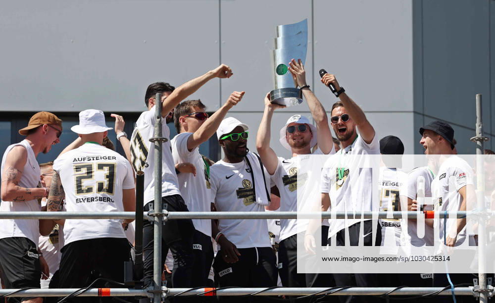 football, men, 3 league, season 2022 2023, champions and promotion celebration of SV 07 Elversberg on the town hall forecourt in Spiesen Elversberg, Semih Sahin, Lukas Pinckert, Kevin Koffi, Nicolas Kristof and Valdrin Mustafa hold up the championship trophy Spiesen Elversberg town hall forecourt Saarland Germany EN