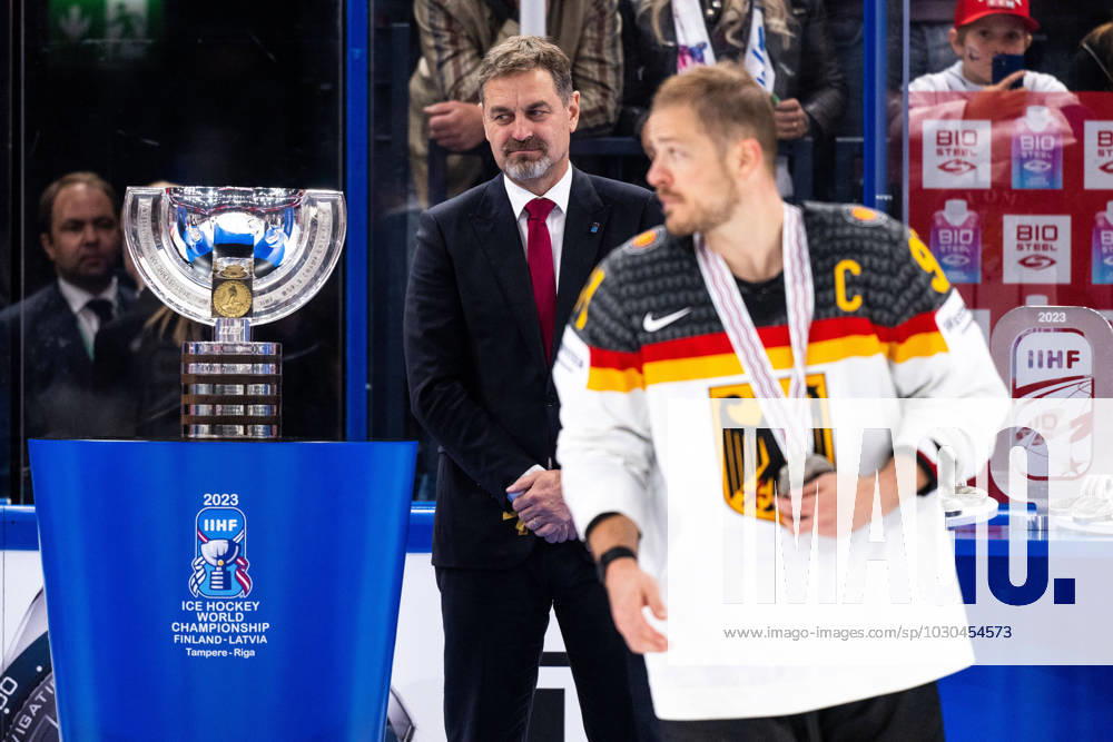 The World Champion trophy and Moritz Müller of Germany during the 2023 IIHF Ice Hockey World Championship final game between Canada and Germany on May 28, 2023 in Tampere Photo Joel Marklund BILDBYRAN kod JM JM0489 bbeng ishockey ice hockey ice hockey vm 2023 ishockey vm vm vm 2023 iihf ice hockey world championship final canada canada germany germany