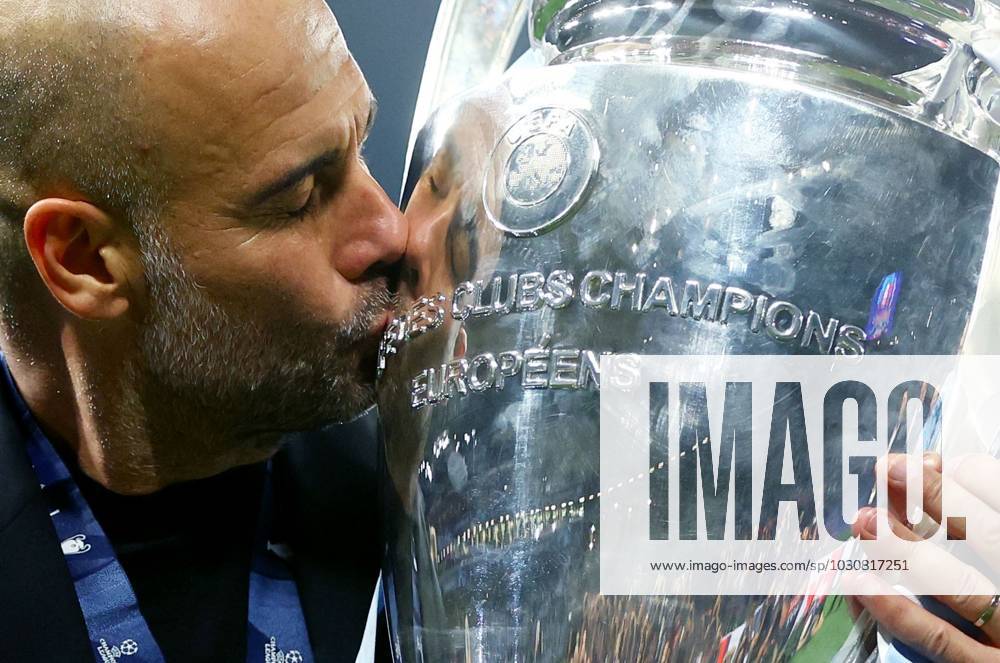 KW23 Mandatory Credit: Photo by Kieran McManus Shutterstock (13949252fv) Manchester City manager Pep Guardiola celebrates with the trophy. Manchester City v Inter Milan, UEFA Champions League, Final, Football, Ataturk Stadium, Istanbul, Turkey - 10 Jun 2023 Manchester City v Inter Milan, UEFA Champions League, Final, Football, Ataturk Stadium, Istanbul, Turkey - 10 Jun 2023