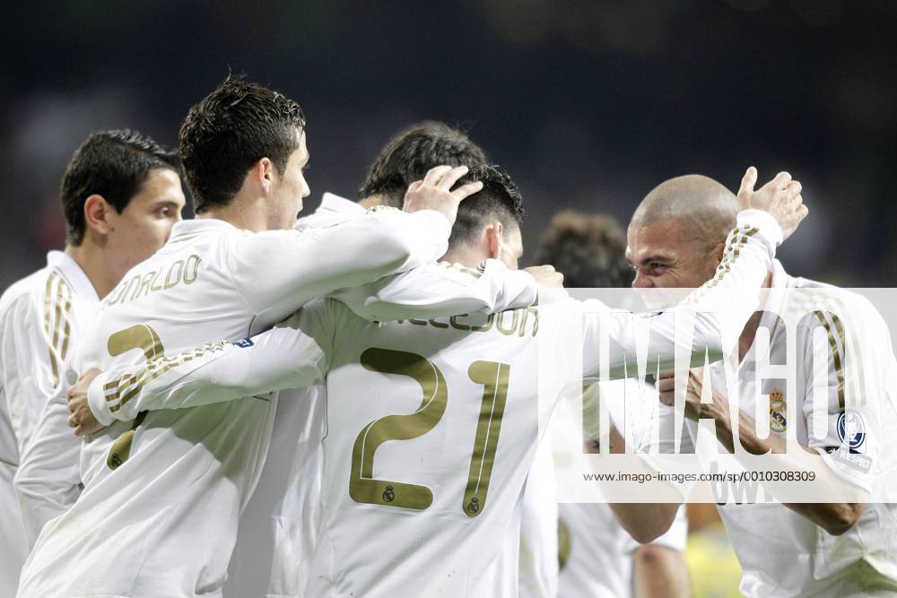 Real Madrid s Jose Callejon celebrates with Pepe and Cristiano Ronaldo during UEFA Champions League Match. April 04, 2012. (201204040027)