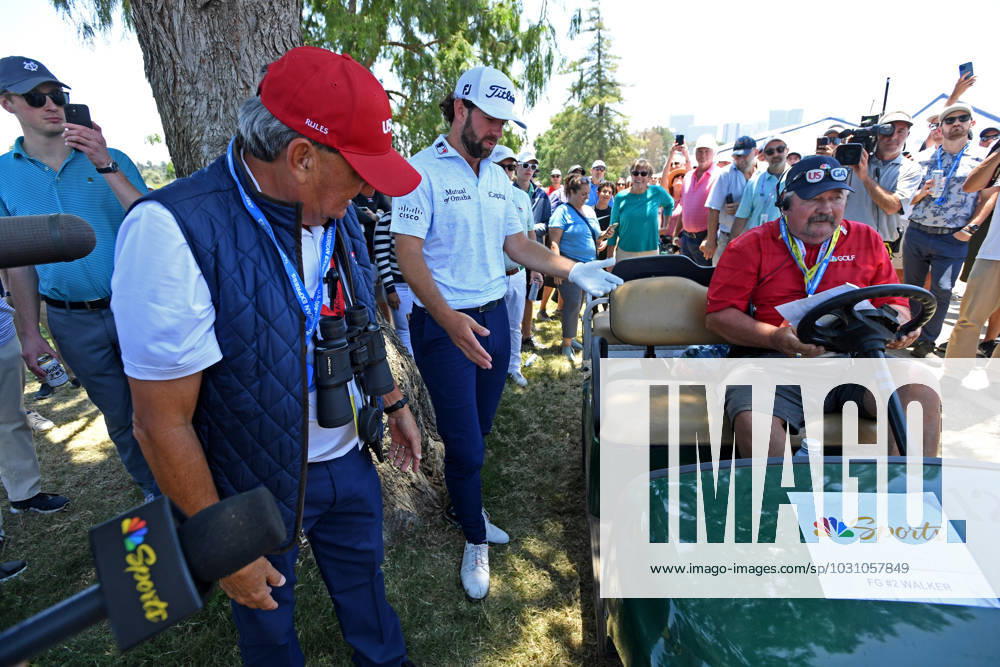 Cameron Young and course officials figure out what to do with Young s errant shot of the 10th fairway during the third round for the 2023 U.S. Open at the Los Angeles Country Club in Los Angeles on Saturday June 17, 2023. LAP2023061702 MIKExGOULDING