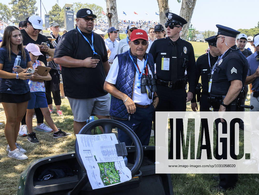 A rules official arrives to a Cameron Young ball that landed on a golf cart outside the ropes of the 10th hole during the Third round of the LACC 123rd U.S. Open Championship on Saturday June 17, 2023 held at the Los Angeles Country Club in Los Angeles, California. JAVIER ROJAS PI Los Angeles USA - ZUMAp124 20230617_zaa_p124_004