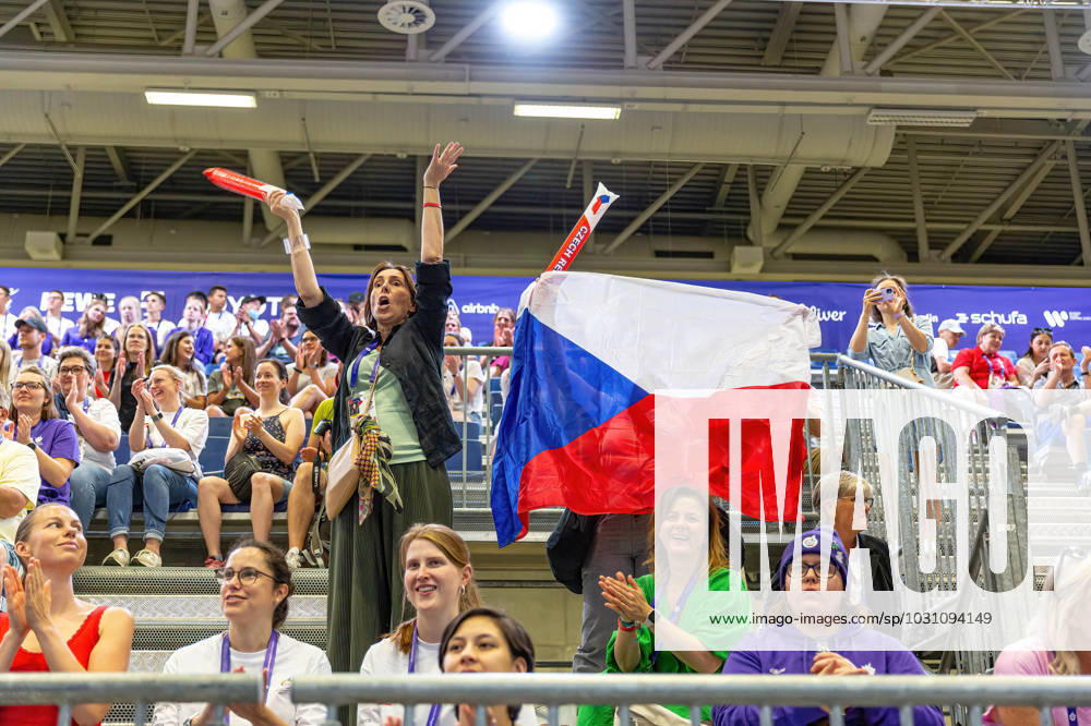 Supporters with Czech Republic flag cheer during Rhythmic gymnastics, Rhythmische Sportgymnastik, RSG competition during the Special Olympics Summer World Games Berlin 2023 in Messe conference centre. The 2023 Berlin Games will host 7000 athletes with learning disabilities from 190 countries. Special Olympics is an international charity which aims to include individuals with learning disabilities into the realm of olympic sports. Berlin 2023 is the biggest sporting as well as charitable event of 2023. Berlin Germany - ZUMAs197 20230618_zaa_s197_123