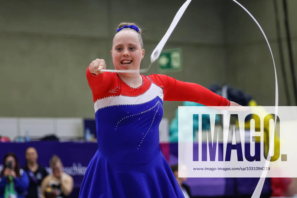 An athlete competes in Rhythmic gymnastics, Rhythmische Sportgymnastik, RSG discipline during the Special Olympics Summer World Games Berlin 2023 in Messe conference centre. The 2023 Berlin Games will host 7000 athletes with learning disabilities from 190 countries. Special Olympics is an international charity which aims to include individuals with learning disabilities into the realm of olympic sports. Berlin 2023 is the biggest sporting as well as charitable event of 2023. Berlin Germany - ZUMAs197 20230618_zaa_s197_140