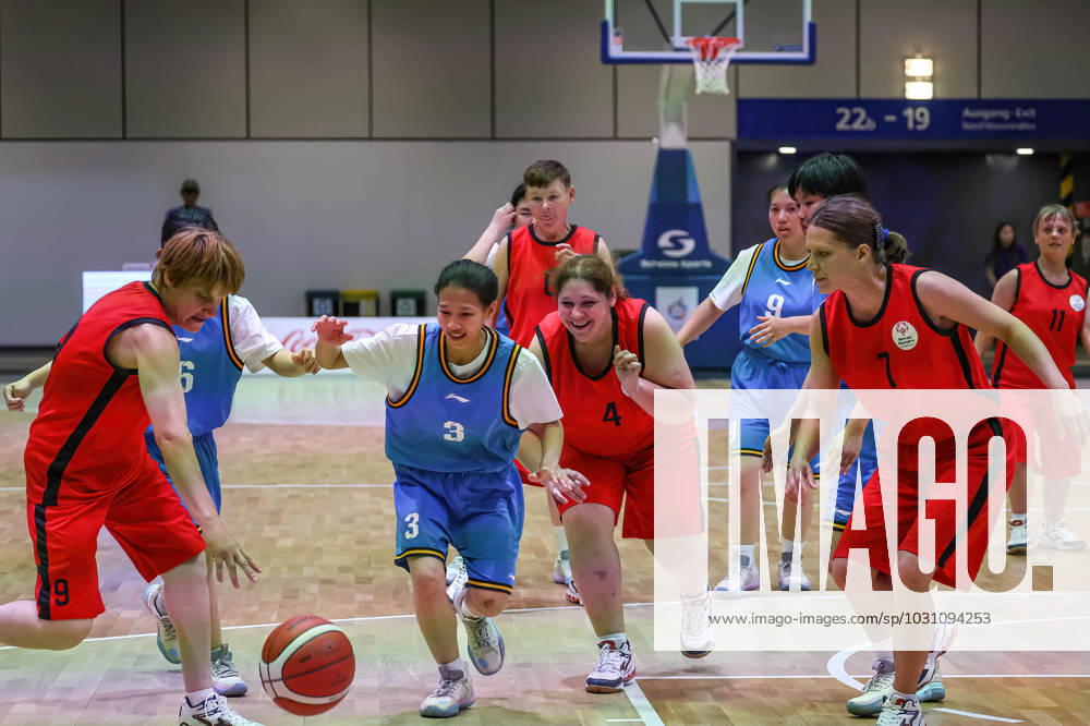 Athletes from China and Kazakhstan compete in basketball discipline during the Special Olympics Summer World Games Berlin 2023 in Messe conference centre. The 2023 Berlin Games will host 7000 athletes with learning disabilities from 190 countries. Special Olympics is an international charity which aims to include individuals with learning disabilities into the realm of olympic sports. Berlin 2023 is the biggest sporting as well as charitable event of 2023. Berlin Germany - ZUMAs197 20230618_zaa_s197_143