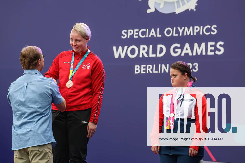 Athletes receive medals during Rhythmic gymnastics, Rhythmische Sportgymnastik, RSG award ceremony during the Special Olympics Summer World Games Berlin 2023 in Messe conference centre. The 2023 Berlin Games will host 7000 athletes with learning disabilities from 190 countries. Special Olympics is an international charity which aims to include individuals with learning disabilities into the realm of olympic sports. Berlin 2023 is the biggest sporting as well as charitable event of 2023. Berlin Germany - ZUMAs197 20230618_zaa_s197_157