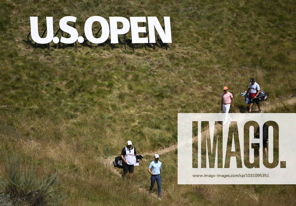 Wyndham Clark and Rickie Fowler make their way to the fourth green during the final round of the 2023 U.S. Open Golf Championship at the Los Angeles Country Club in Los Angeles, California on Sunday, June 18, 2023. LAP20230618756 ALEXxGALLARDO