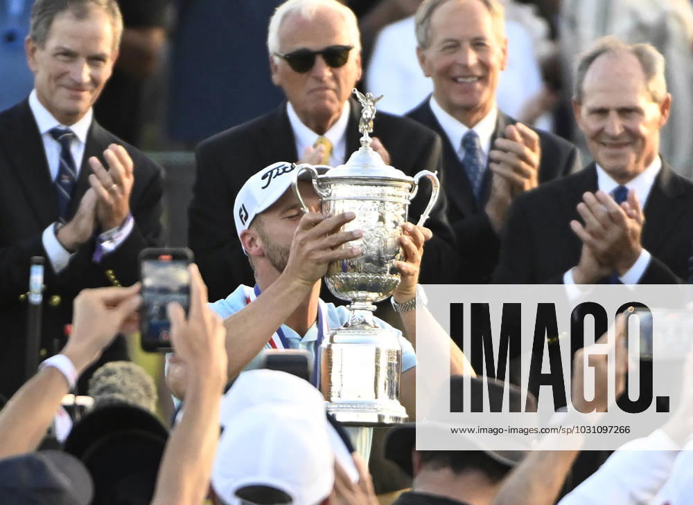 Wyndham Clark celebrates with his trophy after winning the after winning the 2023 U.S. Open Golf Championship at the Los Angeles Country Club in Los Angeles, California on Sunday, June 18, 2023. The win is Clark s first major championship and he shot 64, 67, 69 and 70 for a 10-under-par 270. LAP202306187796 ALEXxGALLARDO