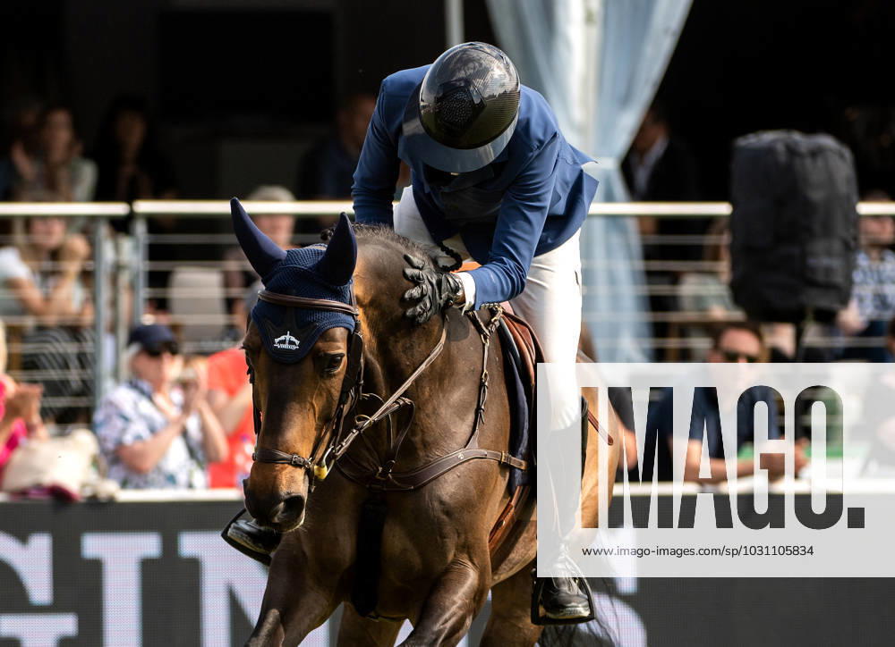 Longines Grand Prix of Switzerland TEST MARTIN FUCHS of Switzerland pats COMMISSAR PEZI after round two of the Longines Grand Prix of Switzerland in St. Gallen, Switzerland, June 4, 2023. TEST St Gallen Switzerland