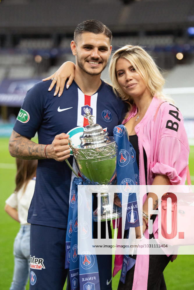 Paris Saint-Germain Win French Cup Paris Saint Germain s Mauro Icardi and his wife Wanda Nara celebrate with the trophy after winning the French Cup during the Final between AS Saint-Etienne and Paris Saint Germain at Stade de France on July 24, 2020 in Saint-Denis, France. PSG defeated Saint Etienne 1-0 and was crowned French Cup winners. Photo by David Niviere ABACAPRESS.COM SAINT-DENIS France
