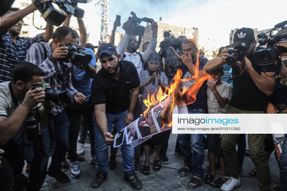 Northern The Gaza Strip, The Gaza Strip, Palestine: Palestinians northern the Gaza Strip burn Trump and Netanyahu pic during protest against UAE-Israel deal Northern The Gaza Strip Palestine - ZUMAq100 20200815_zaa_q100_013