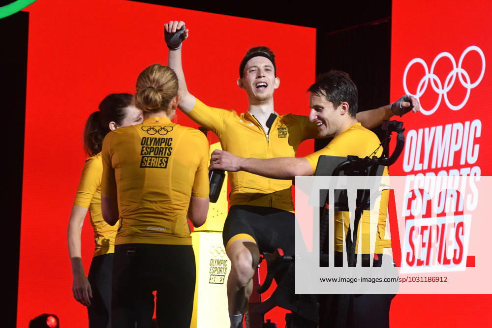 KW25 (230623) -- SINGAPORE, June 23, 2023 -- Martin Maertens (2nd R) of Team Fuego celebrates with teammates after the cycling event at the Olympic ESports Week 2023 held in Singapore on June 23, 2023. (Photo by Xinhua) (SP)SINGAPORE-OLYMPIC ESPORTS WEEK ThenxChihxWey